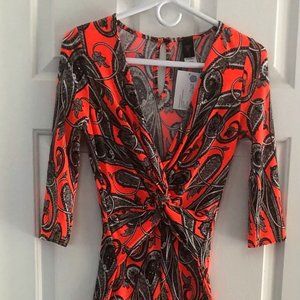GIBIU Jumpsuit in Bright Orange Paisley Print